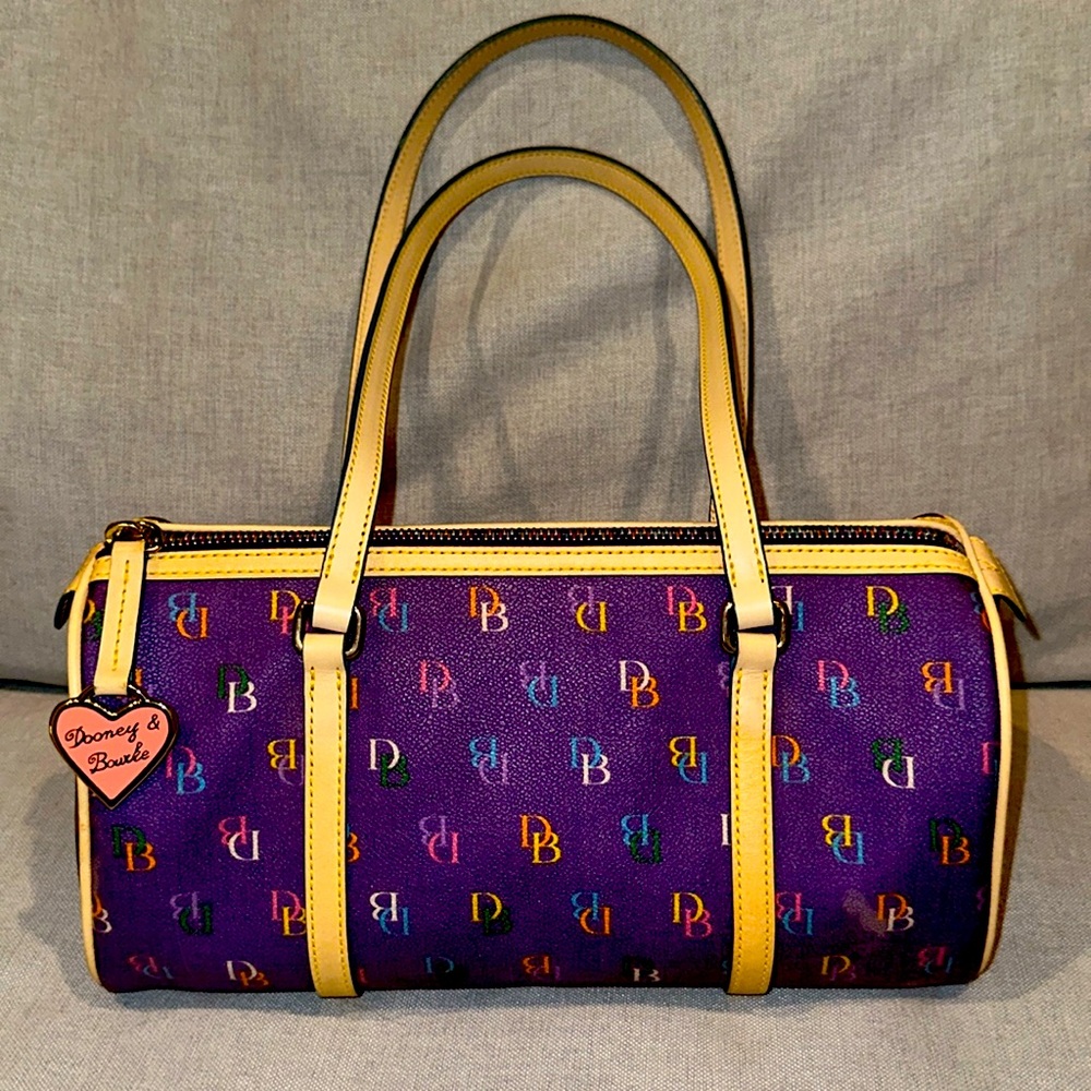 Vintage Dooney and Bourke with Dooney and Bourke bag charm in pristine condition